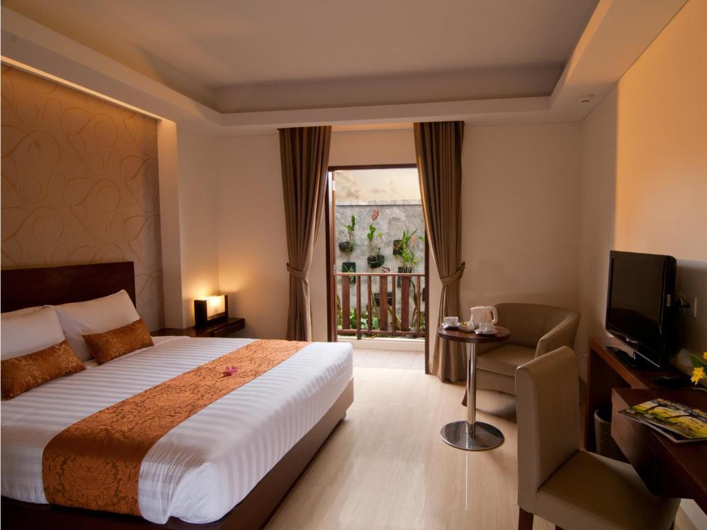 D'Primahotel Seminyak Стая снимка
